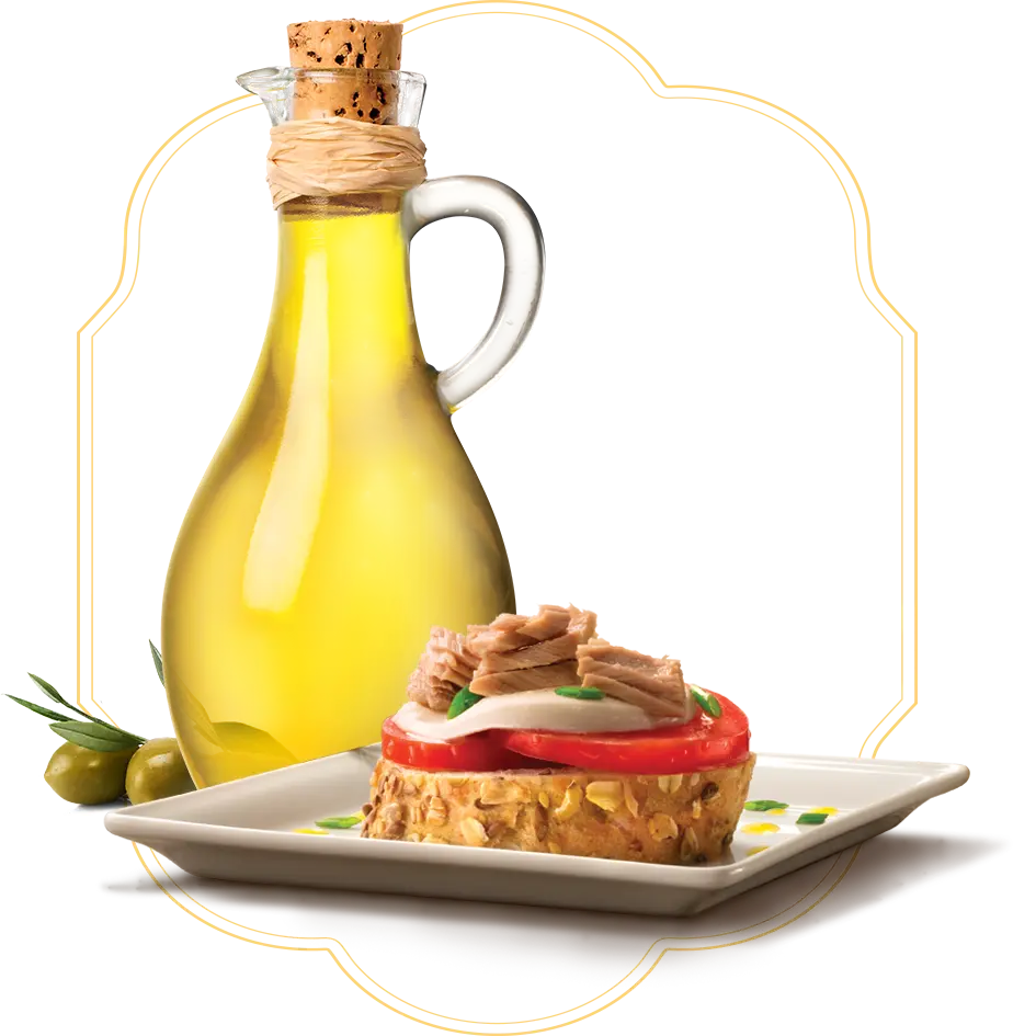 Jar of extra virgin olive oil with a tuna dish